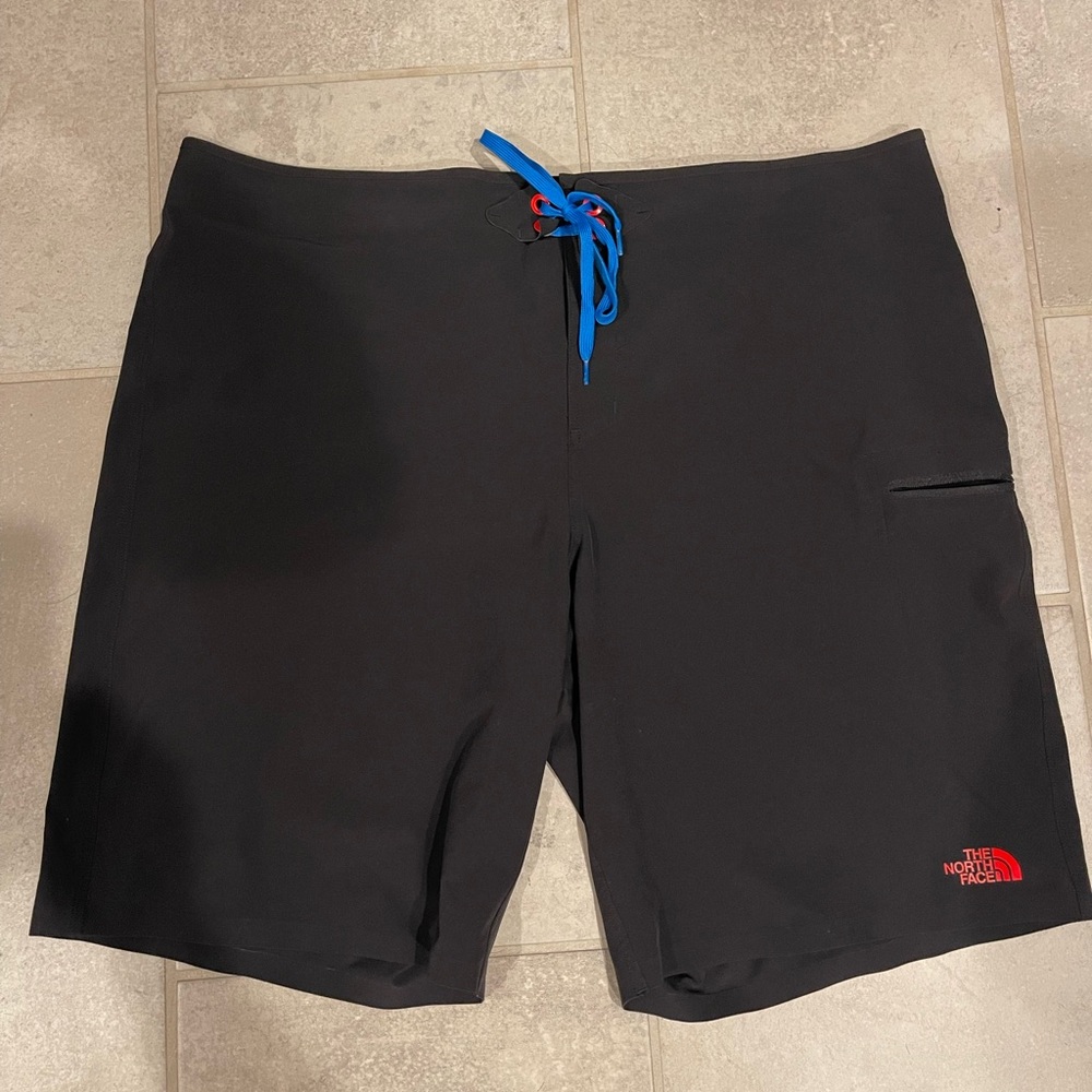 The North Face Men's Black Swim Board Shorts with Blue and Red Accents